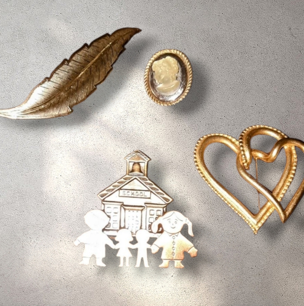 4 brooches Multitone feather, schoolhouse, Double heart, cameo